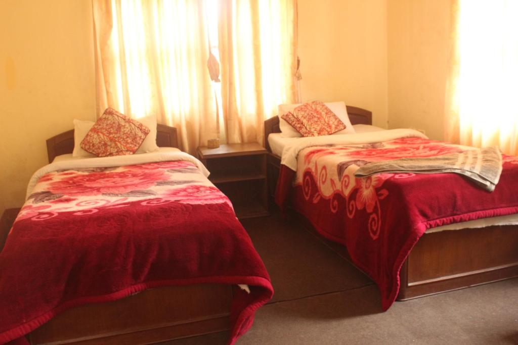 Postel nebo postele na pokoji v ubytování Hotel Vision