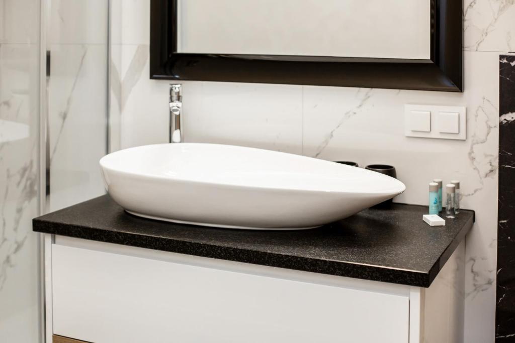Kúpeľňa v ubytovaní Apartments Warsaw Przyokopowa by Noclegi Renters