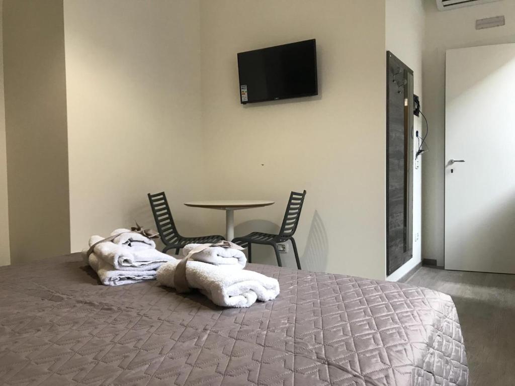 A bed or beds in a room at BorgoNove