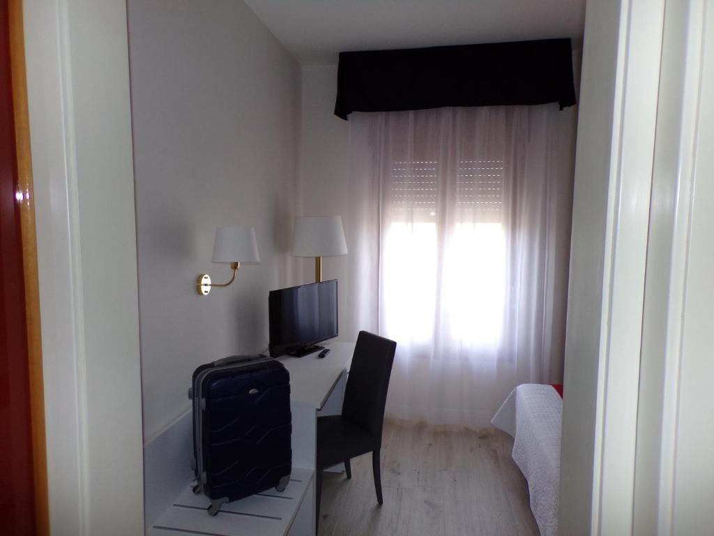 TV a/nebo společenská místnost v ubytování Hotel Master