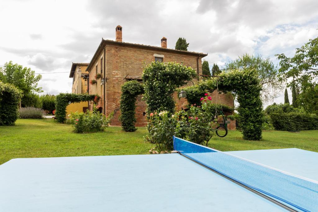 an empty trampoline in front of a house at Tenuta Di Argiano A Montepulciano in Chianciano Terme