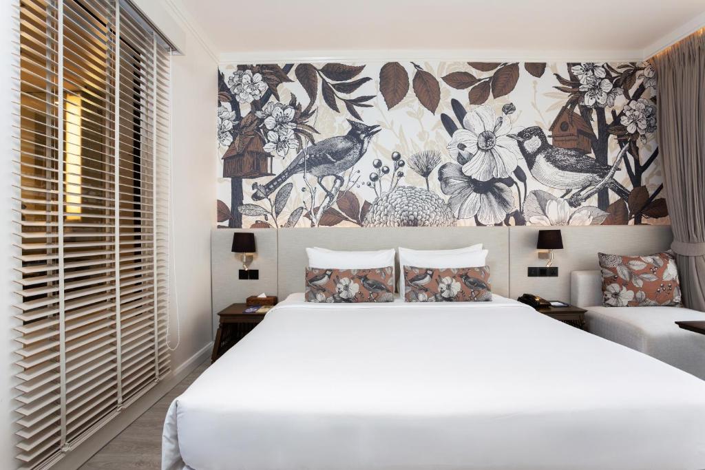 Cama ou camas em um quarto em Deevana Plaza Krabi Aonang