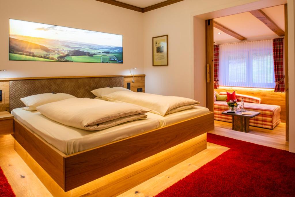 Postel nebo postele na pokoji v ubytování Hotel Kleins Wiese