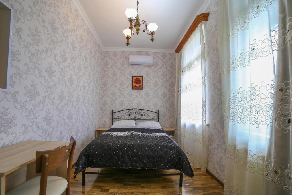Postel nebo postele na pokoji v ubytování Savanna Guest House