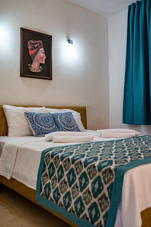 Postel nebo postele na pokoji v ubytování San Simon Hotel