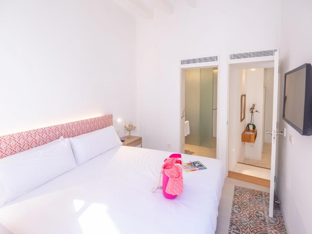 Postel nebo postele na pokoji v ubytování Es Palauet New duplex in Ibiza center with Dalt Vila views