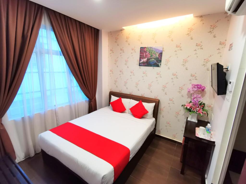 Postel nebo postele na pokoji v ubytování Palazzo Hotel Kulai