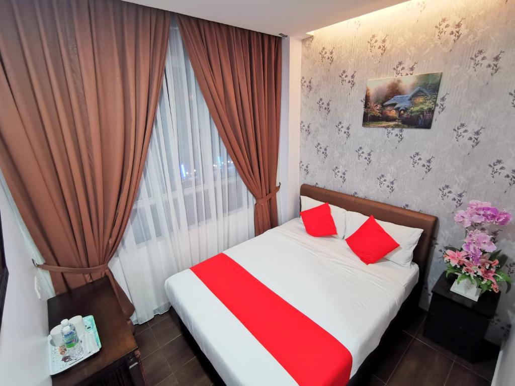 Postel nebo postele na pokoji v ubytování Palazzo Hotel Kulai