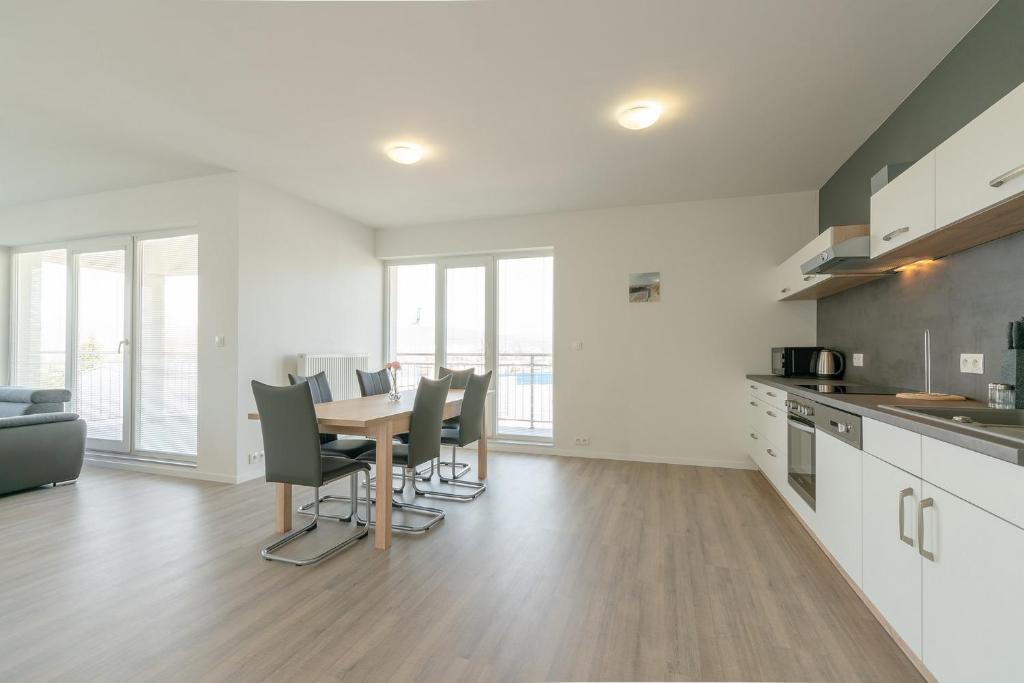 Kuchyňa alebo kuchynka v ubytovaní Apartmány Noviny