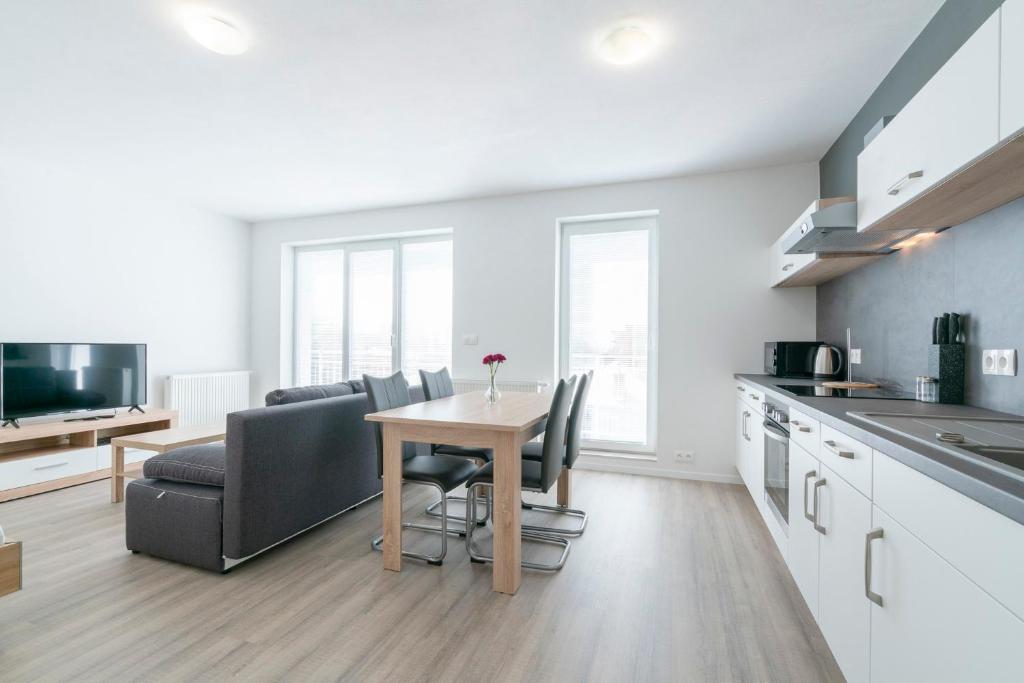 Kuchyňa alebo kuchynka v ubytovaní Apartmány Noviny