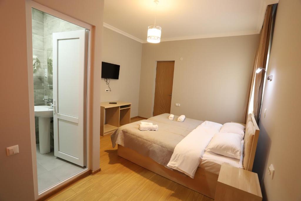 Postel nebo postele na pokoji v ubytování Hotel Hollywood