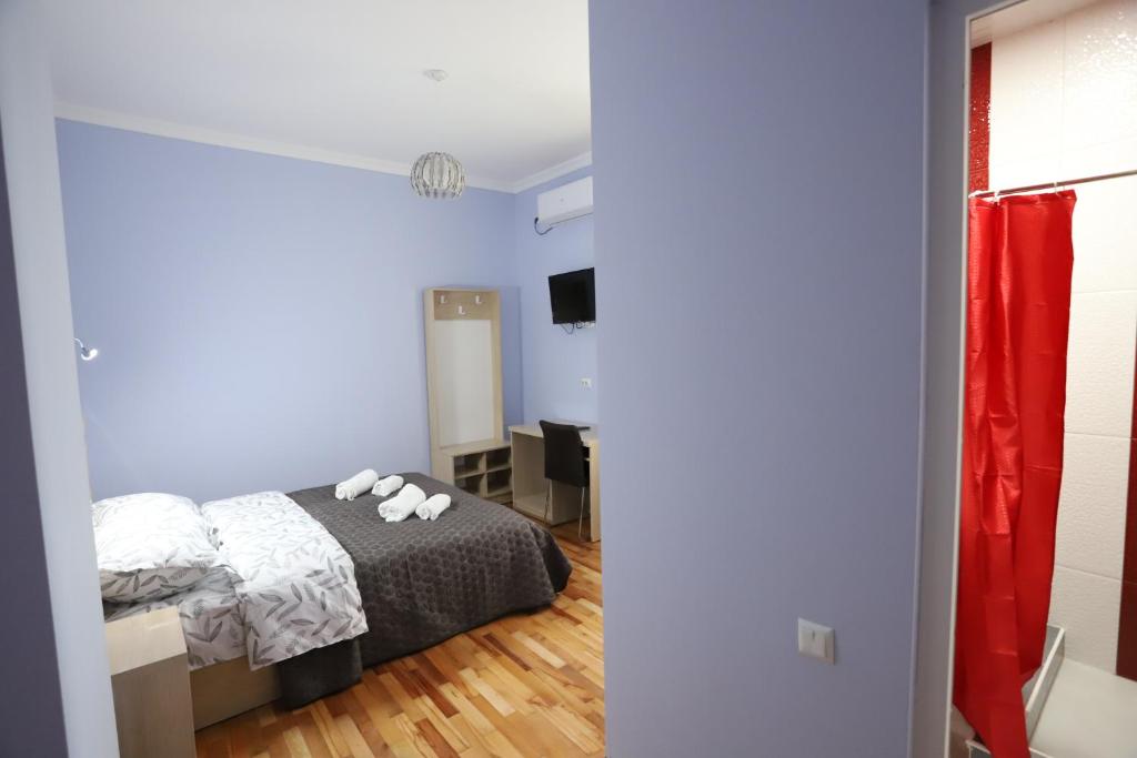 Postel nebo postele na pokoji v ubytování Hotel Hollywood
