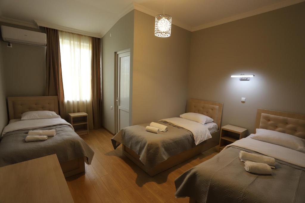 Postel nebo postele na pokoji v ubytování Hotel Hollywood