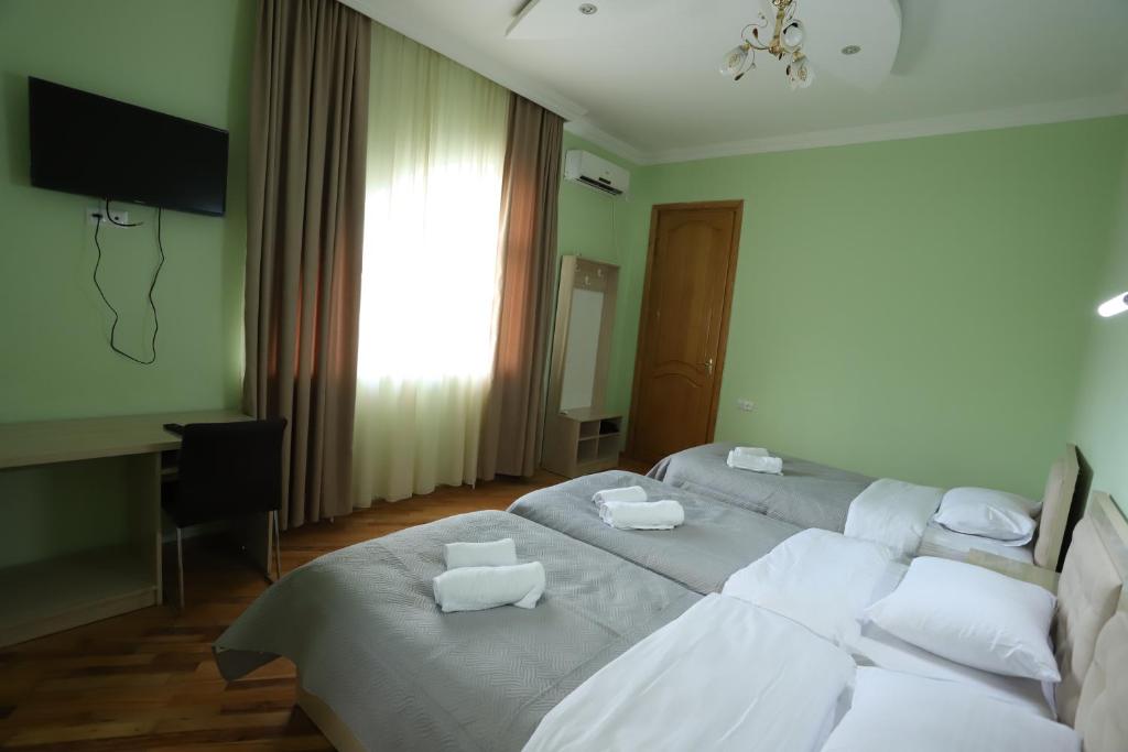 Postel nebo postele na pokoji v ubytování Hotel Hollywood