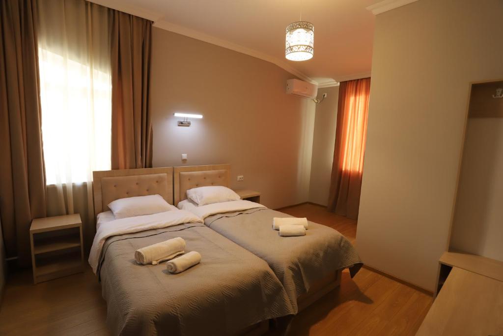 Postel nebo postele na pokoji v ubytování Hotel Hollywood
