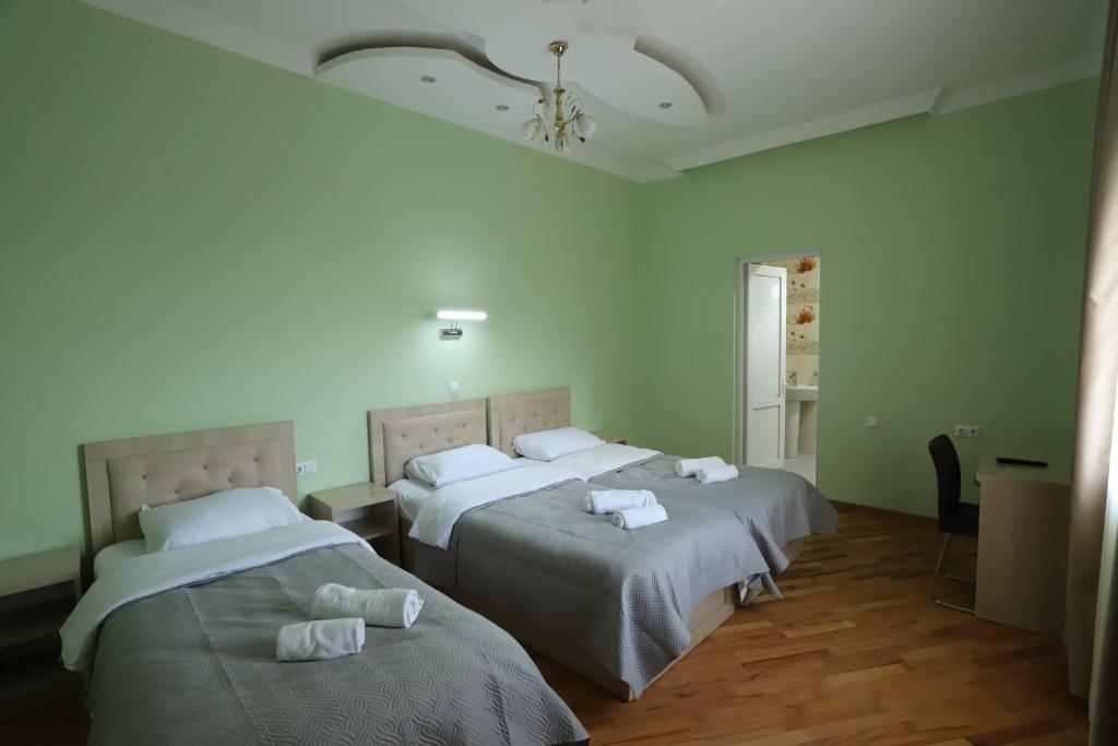 Postel nebo postele na pokoji v ubytování Hotel Hollywood