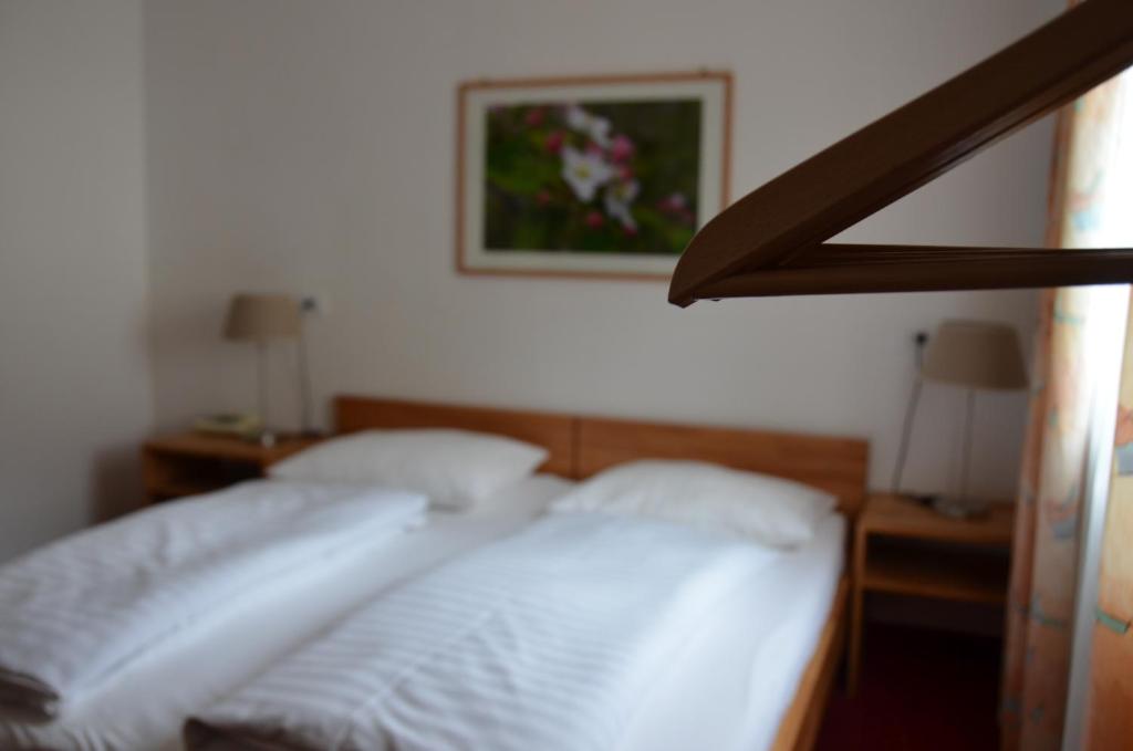 Łóżko lub łóżka w pokoju w obiekcie Landhotel Anna