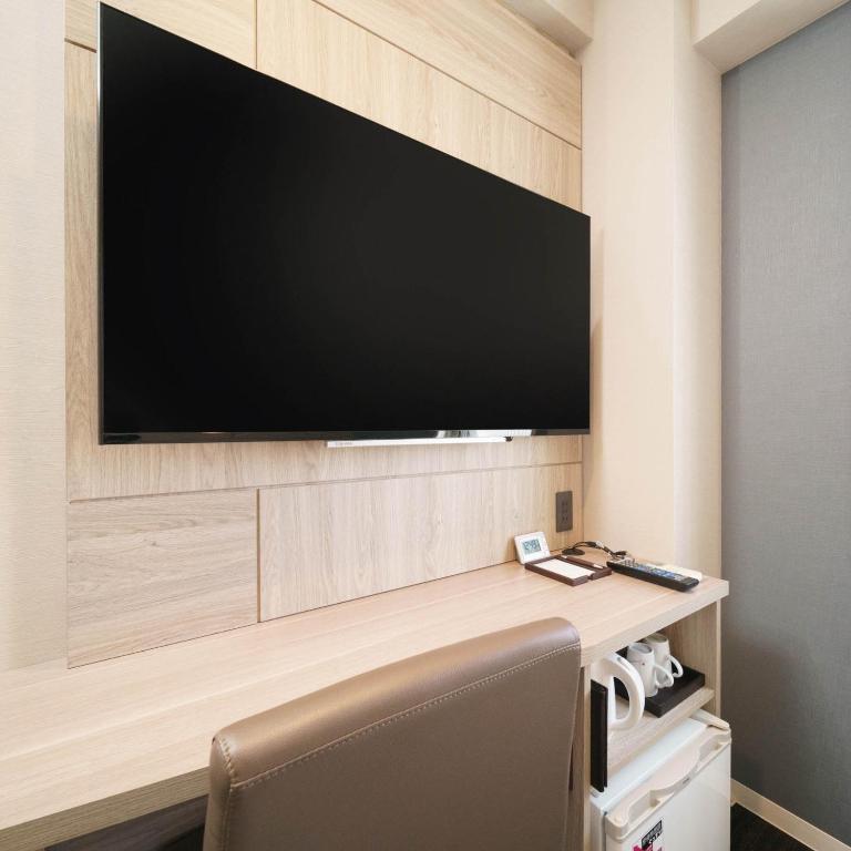 TV a/nebo společenská místnost v ubytování Super Hotel Hida Takayama