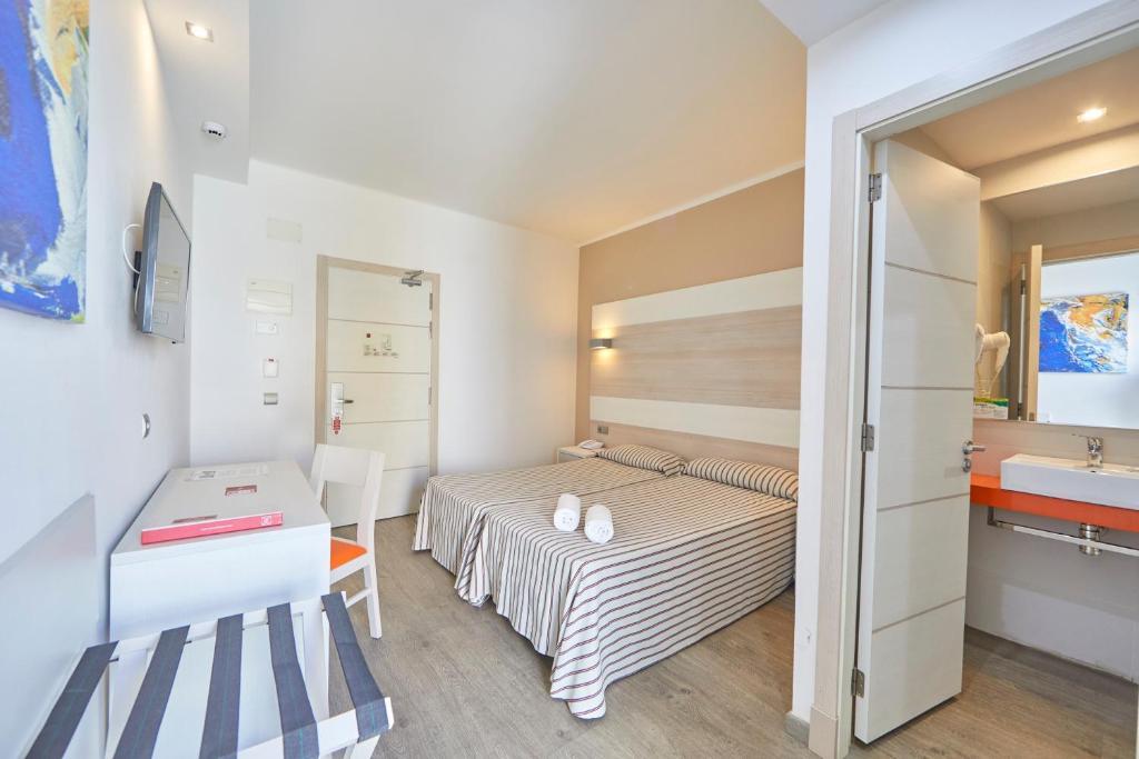 Postel nebo postele na pokoji v ubytování MLL Palma Bay Club Resort