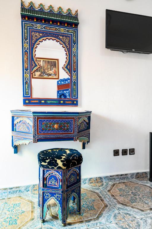 TV a/nebo společenská místnost v ubytování Moroccan House