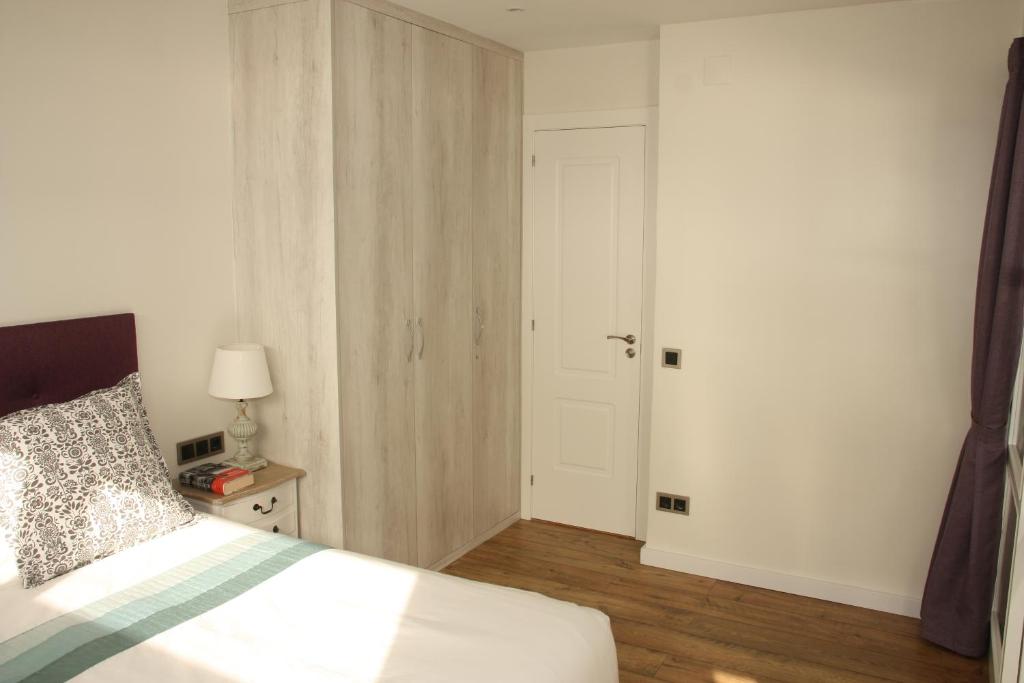 Posteľ alebo postele v izbe v ubytovaní Seafront Apartment in Palamós