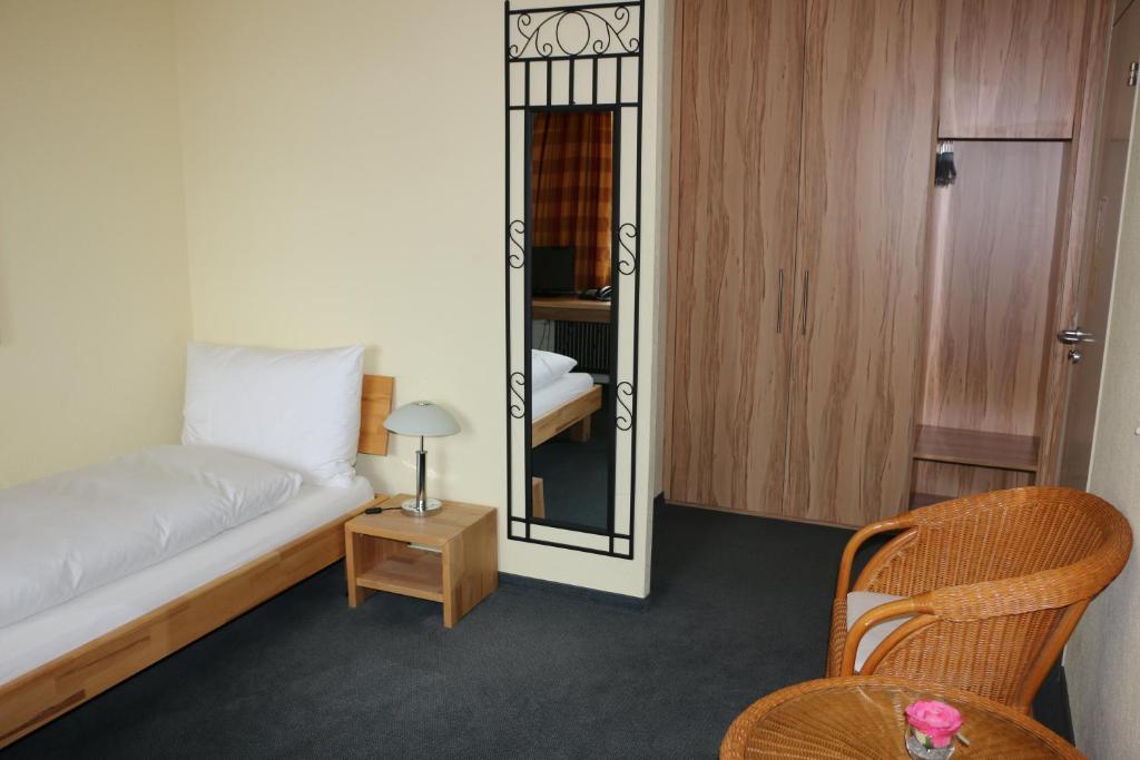 Postel nebo postele na pokoji v ubytování Hotel & Bildungszentrum Matt