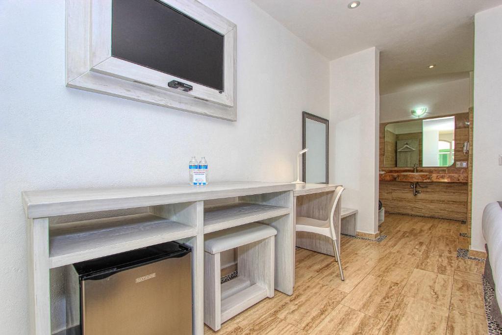 TV a/nebo společenská místnost v ubytování Hotel Splash Inn