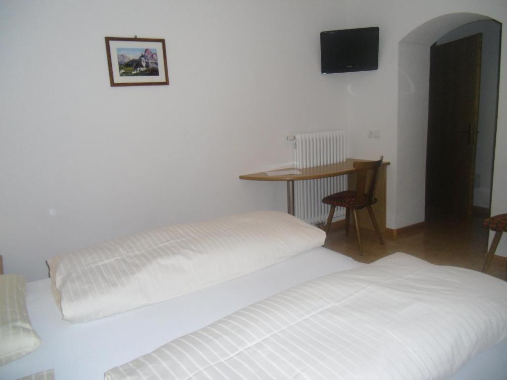 Postel nebo postele na pokoji v ubytování Garni Margherita