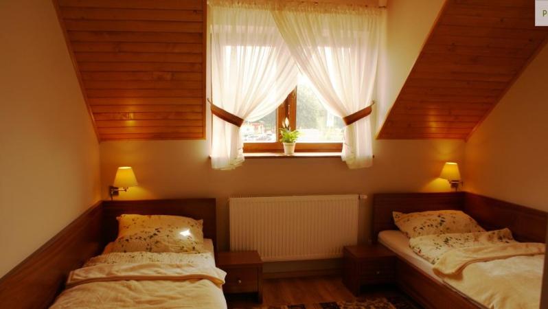 Postel nebo postele na pokoji v ubytování A-Prim