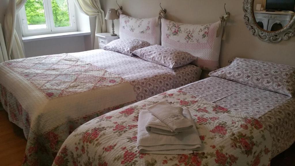 Postel nebo postele na pokoji v ubytování Bed & Bistrò Che Piasì