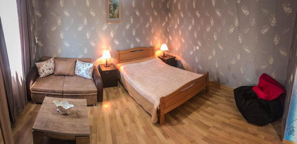 Postel nebo postele na pokoji v ubytování Family Hotel Mountain Scream