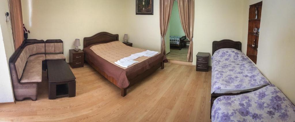 Postel nebo postele na pokoji v ubytování Family Hotel Mountain Scream