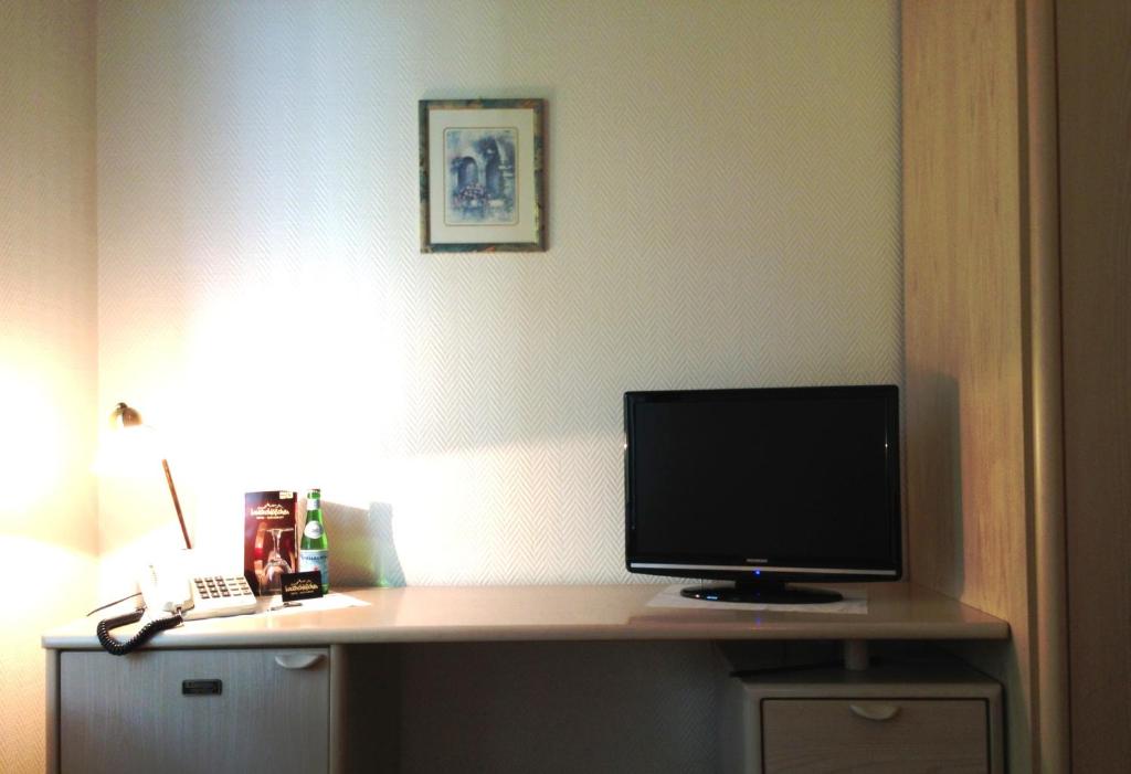 TV a/nebo společenská místnost v ubytování Hotel Waldschlösschen