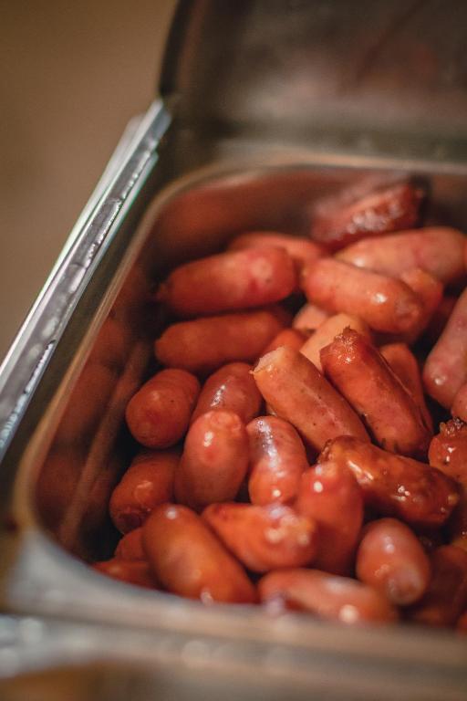 a tray of hot dogs in a pan at Hótel Dyrhólaey in Vík