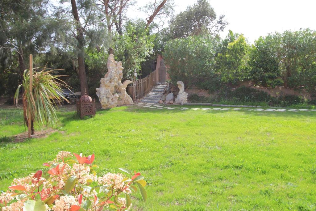 Zahrada ubytování Villas CALA CORSA - 3 et 4 Chambres - CALA ROSSA Porto-Vecchio - Villas entièrement Climatisées avec Piscine Chauffée partagée et Piscines Privées - Internet gratuit