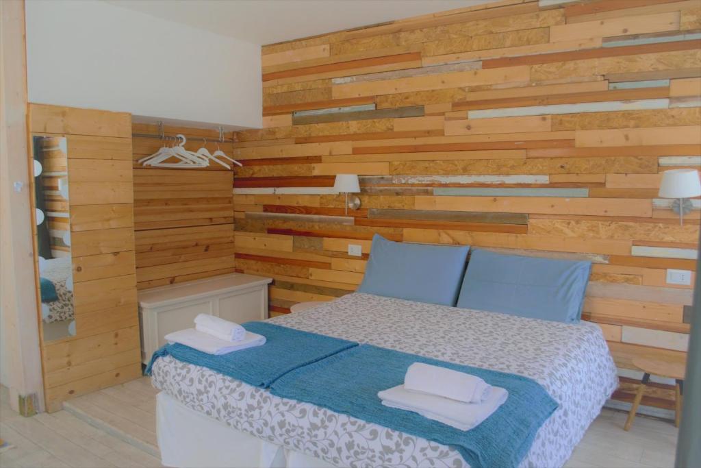Postel nebo postele na pokoji v ubytování B&B Cappuccini