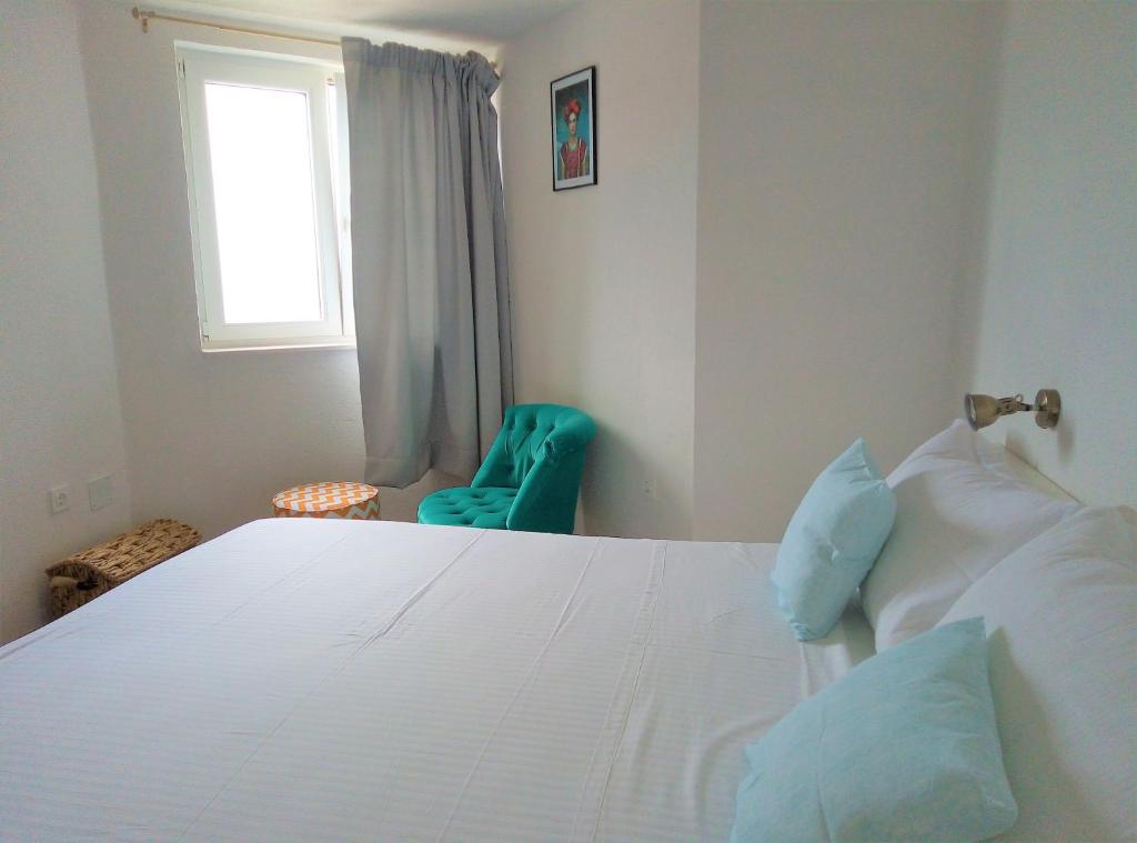 Posteľ alebo postele v izbe v ubytovaní Apartments Kurelja