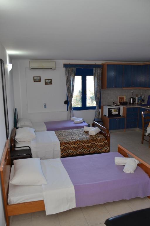 Postel nebo postele na pokoji v ubytování Sofia Apartment