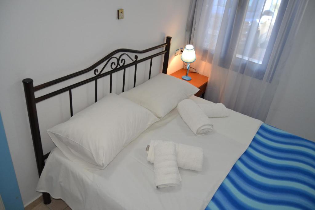 Postel nebo postele na pokoji v ubytování Sofia Apartment