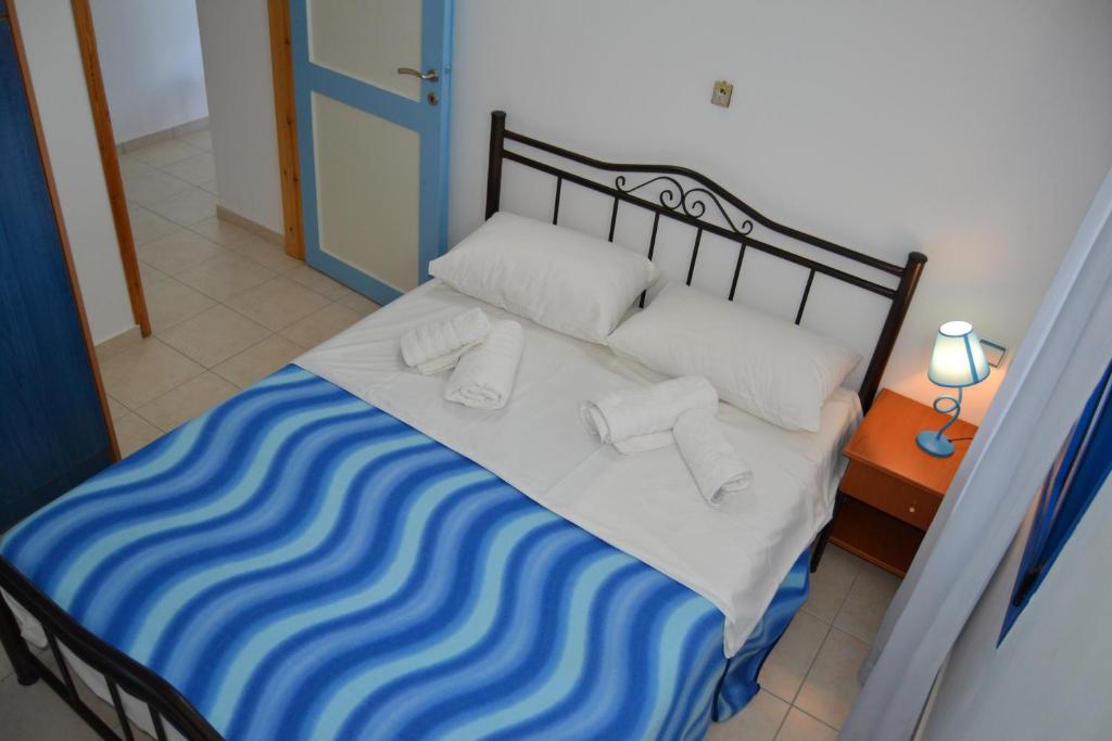 Postel nebo postele na pokoji v ubytování Sofia Apartment