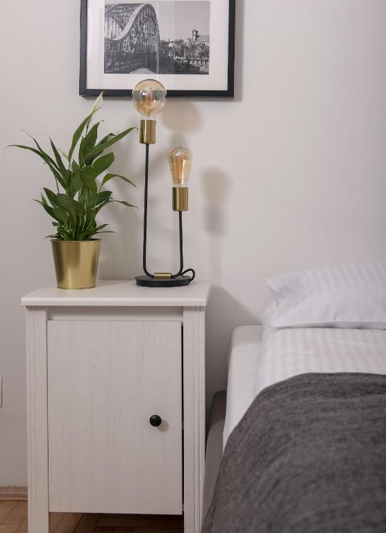 Posteľ alebo postele v izbe v ubytovaní 3D FLORIANSKA 15 Apartament