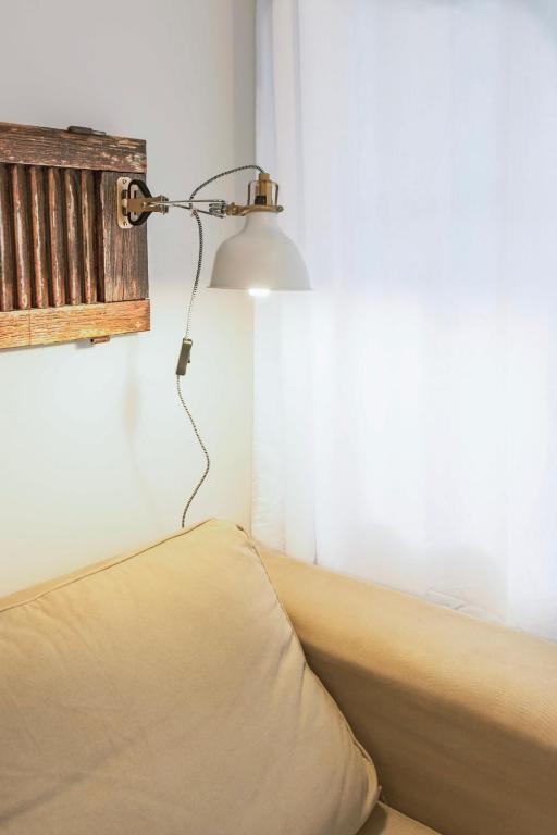 A bed or beds in a room at Lacatorce Apartment