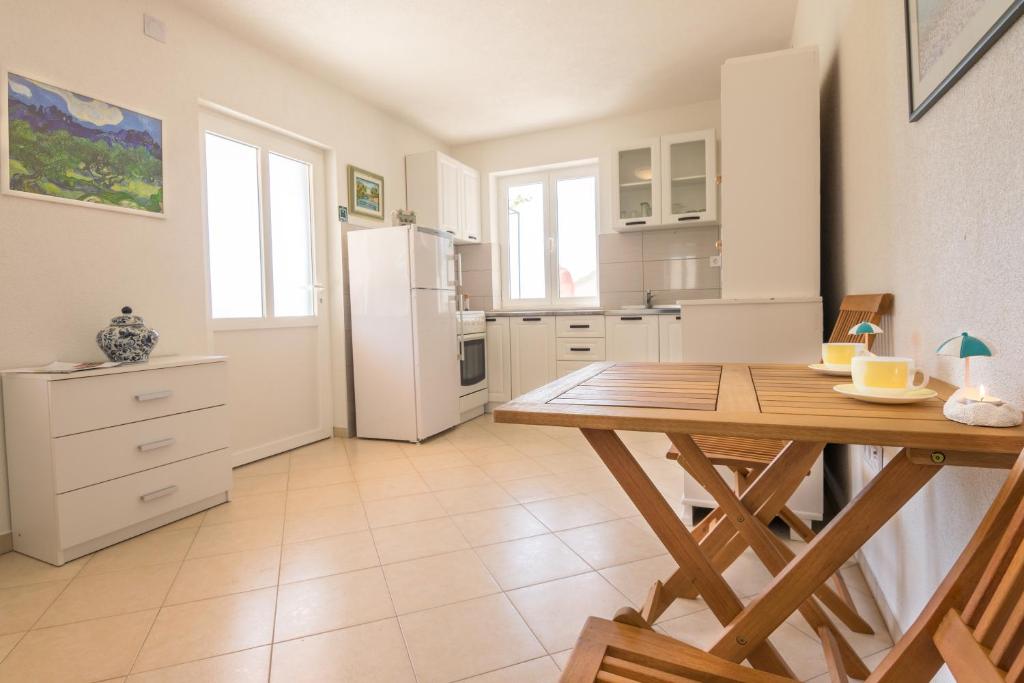 Kuchyň nebo kuchyňský kout v ubytování Apartman Pharia