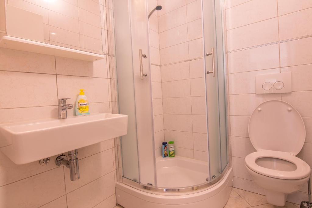 Koupelna v ubytování Apartman Pharia