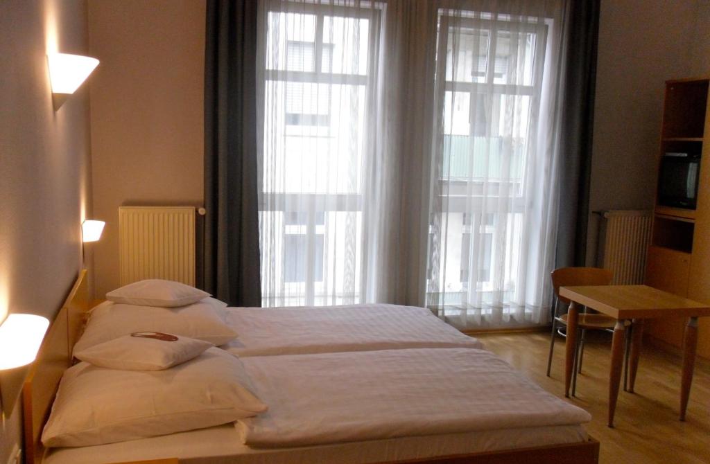Postel nebo postele na pokoji v ubytování Hotel zum Scheppen Eck