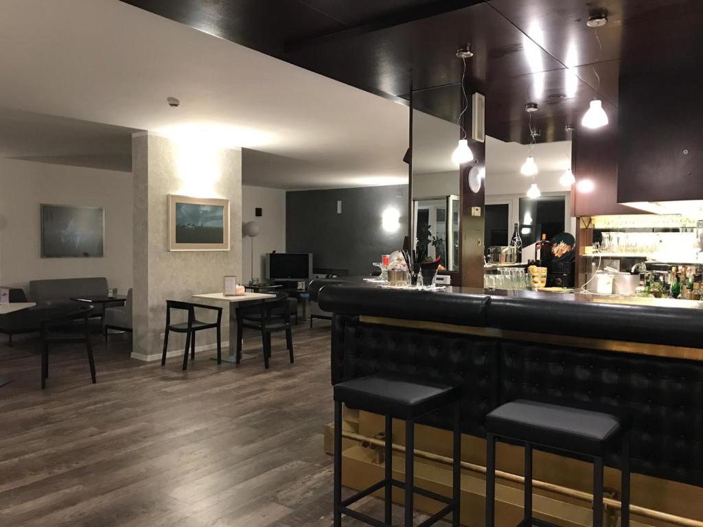 Kuchyň nebo kuchyňský kout v ubytování Hotel Piccolo Mondo