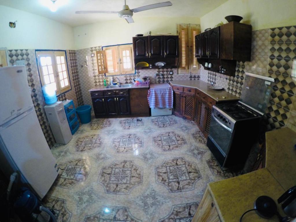 Kuchyň nebo kuchyňský kout v ubytování villa tunis village