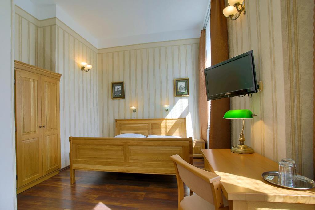 TV a/nebo společenská místnost v ubytování Hotel Štekl - Hrubá Skála
