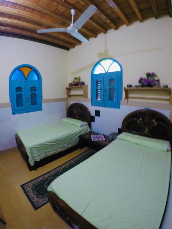 Postel nebo postele na pokoji v ubytování villa tunis village