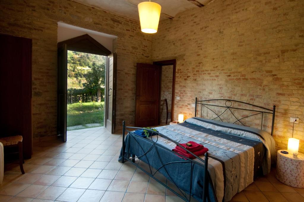 Postel nebo postele na pokoji v ubytování Casa dell'Orto